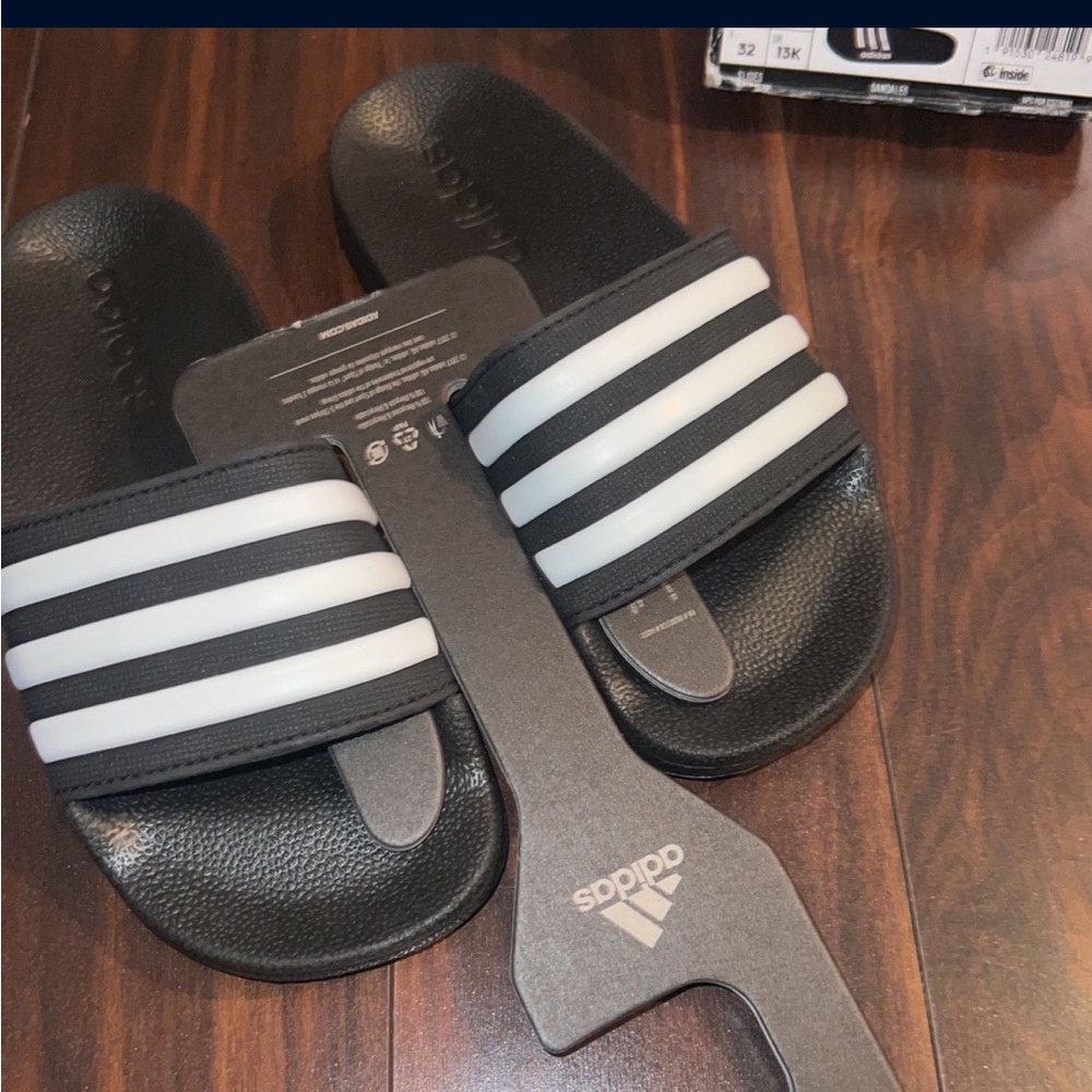 Adidas kids slides.